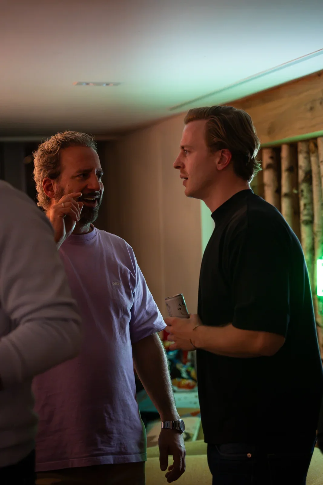 Evan Gelders talking with a visitor